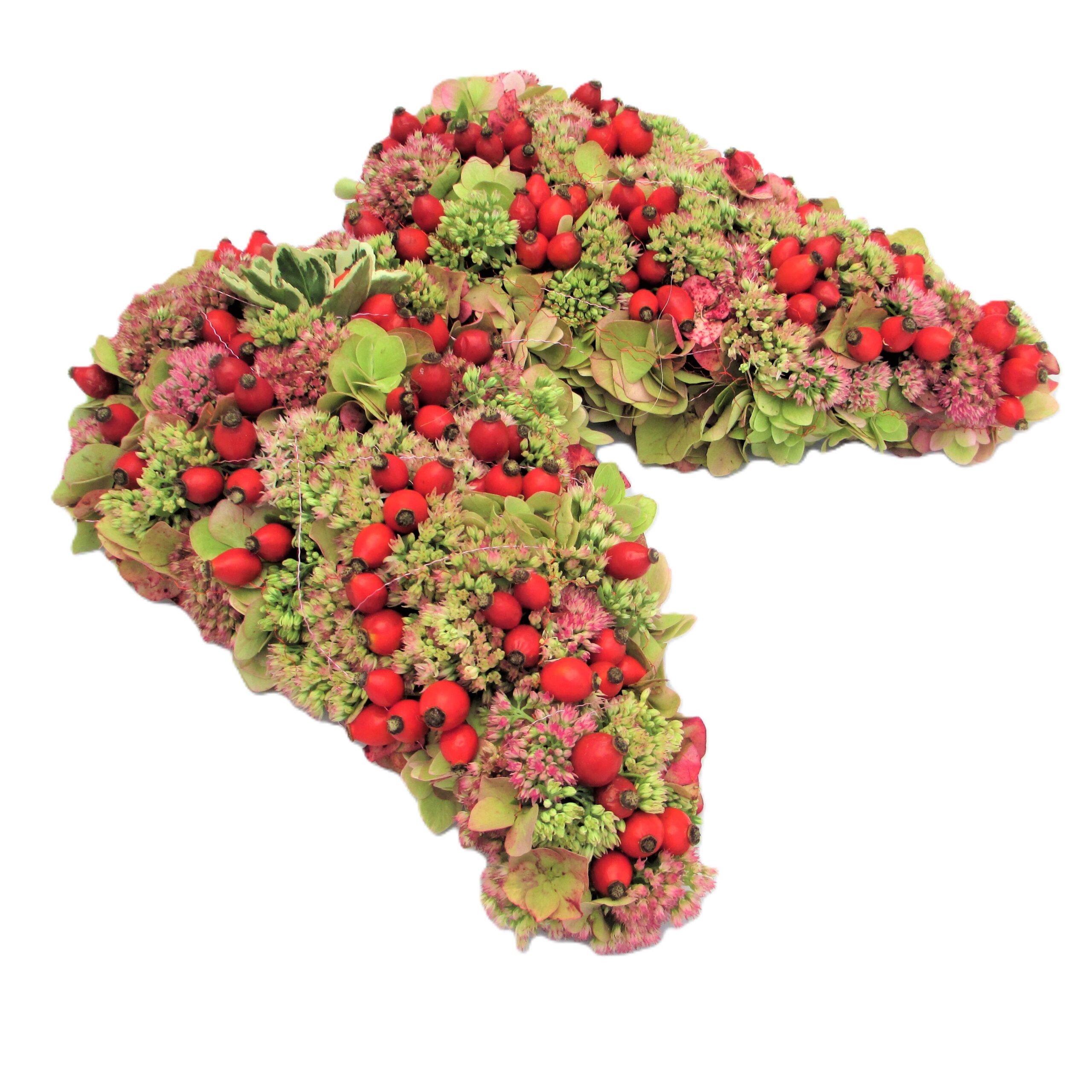 Trauerfloristik - Lieblicher Engelsflügel aus Saison Blüten gesteckt